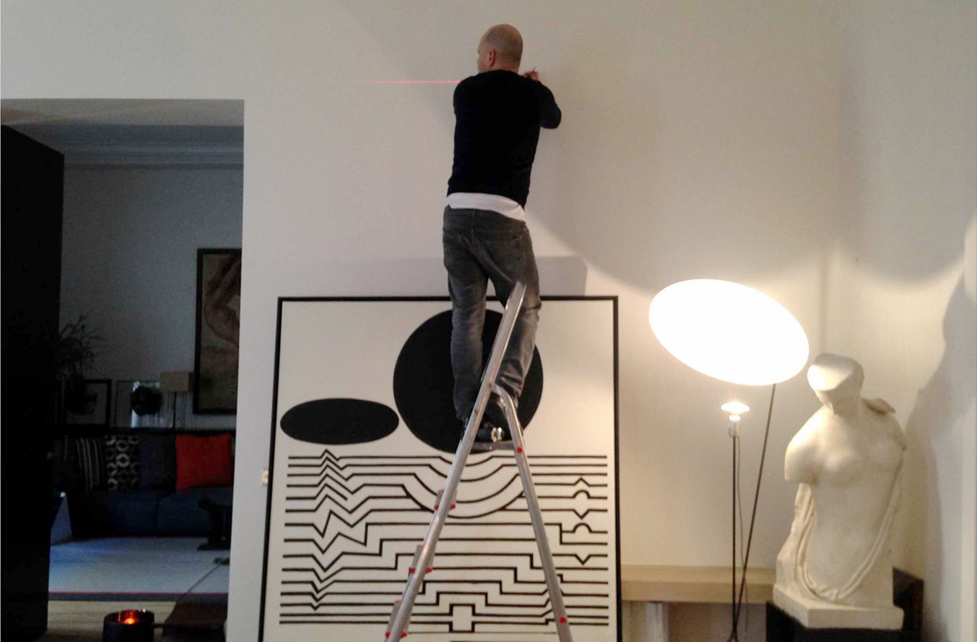 The Atelier Mondineu performs hanging and artwork setup services